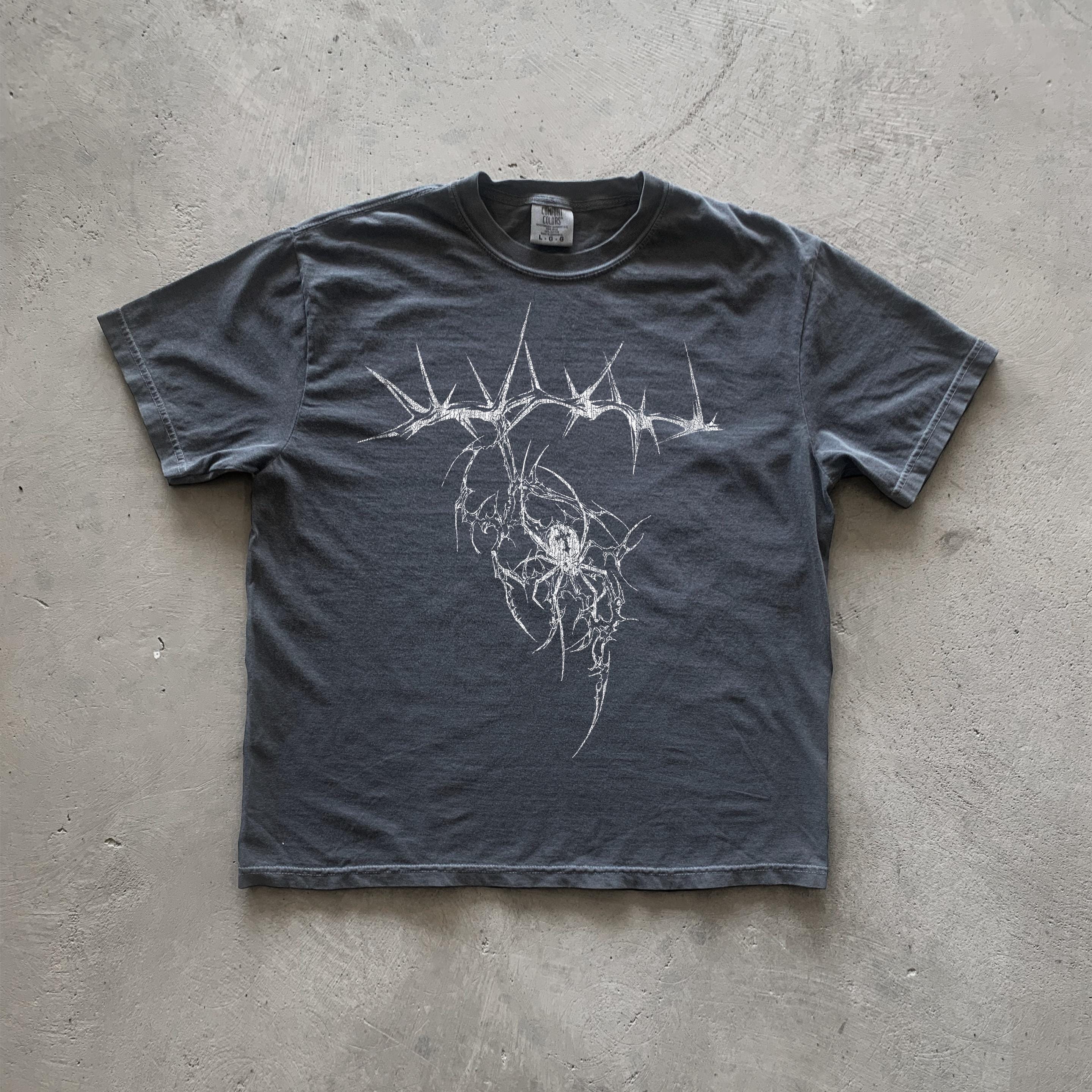 Dark gray cotton t-shirt featuring a graphic design of a spider encircled by thorns.